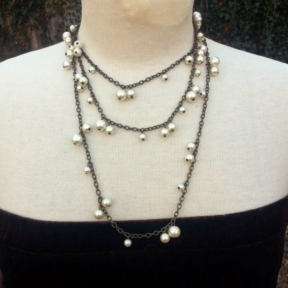 Flapper length necklace bronze w/pearl bunches